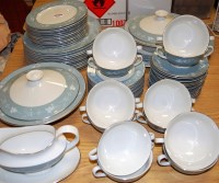 Lot 101 - A Royal Doulton eight place setting tea and...