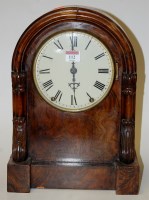 Lot 112 - A Victorian walnut cased dome-top mantel clock,...