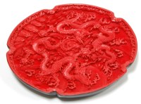 Lot 115 - A reproduction Chinese cinnabar lacquered...