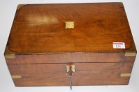 Lot 136 - A Victorian walnut and brass bound writing...