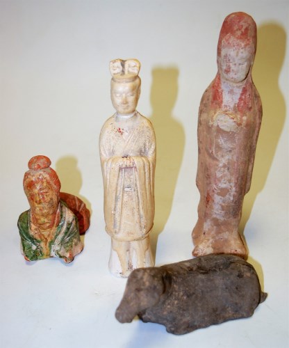 Lot 229 - A Sui dynasty(?) figure of a robed man in...