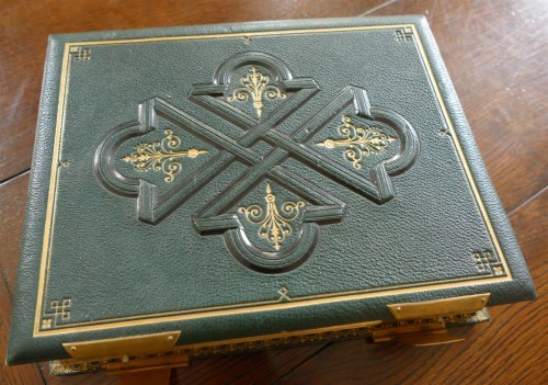 Lot 2151 - A large morrocco bound photograph album with...
