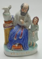 Lot 2 - A Victorian Staffordshire pottery figure...
