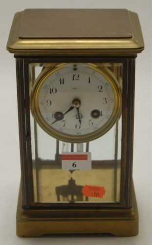 Lot 6 - An English lacquered brass cased mantel clock,...