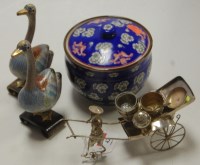 Lot 42 - A Chinese white metal model of a street vendor...
