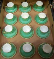 Lot 67 - A set of 12 Royal Worcester porcelain coffee...