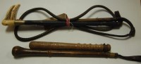 Lot 108 - A leather cosh, a turned wooden truncheon, and...