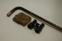 Lot 113 - A silver topped walking cane, and a cased pair...
