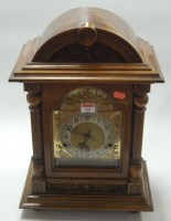 Lot 121 - A Continental walnut cased mantel clock, circa...