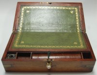 Lot 130 - A 19th century mahogany and brass capped...