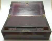 Lot 137 - An early Victorian rosewood and brass bound...