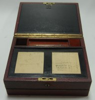 Lot 138 - A Victorian tooled red leather bound fitted...
