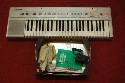 Lot 146 - A Casiotone CT-350 keyboard with sheet music