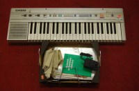 Lot 146 - A Casiotone CT-350 keyboard with sheet music