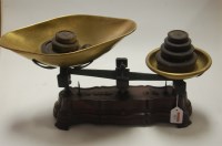 Lot 153 - A cast iron pan scale with weights and brass...