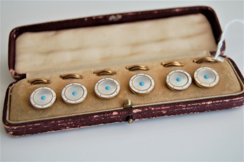 Lot 335 - A set of six enamel buttons, each button...