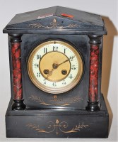 Lot 27 - A circa 1900 black slate mantel clock, of...