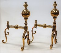 Lot 32 - A pair of early 20th century turned brass...