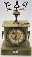 Lot 40 - A circa 1900 onyx cased mantel clock, having...
