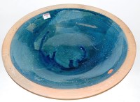 Lot 97 - A large contemporary terracotta bowl, the blue...