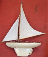 Lot 108 - An early 20th century cream painted pond yacht...