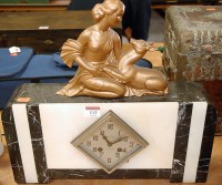 Lot 113 - An Art Deco veined marble cased mantel clock,...