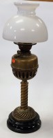 Lot 116 - An early 20th century brass oil lamp having...