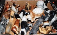 Lot 123 - A box of assorted ceramic dog ornaments,...