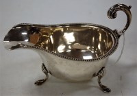 Lot 189 - A George V silver sauce boat in the 18th...