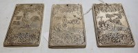 Lot 231 - A set of three Chinese white metal tokens,...
