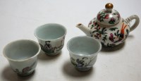 Lot 237 - A miniature Chinese porcelain teapot of bullet...