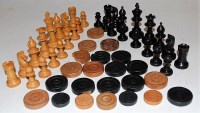 Lot 267 - A set of turned ebony and boxwood chess pieces,...