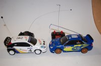 Lot 1546 - Two loose radio controlled cars, to include a...
