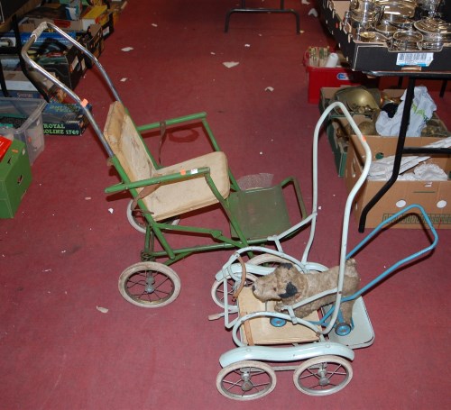 Lot 1764 - Two various dolls prams and a push-along dog,...