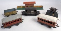 Lot 281 - A collection of mixed 00 and 0 gauge tinplate...