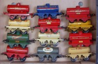 Lot 324 - A large tray containing 12 pre war tank wagons...