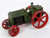 Lot 1360 - An early Tootsie Toys farm tractor, comprising...