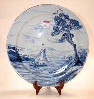 Lot 10 - An 18th century Liverpool Delft charger...