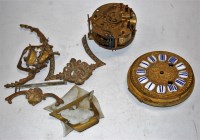 Lot 24 - A small quantity of clock parts to include a...