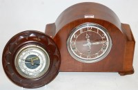 Lot 32 - An Enfield walnut cased mantel clock with...