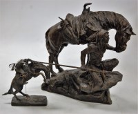 Lot 39 - A reproduction bronze group of a native...