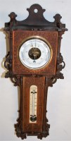 Lot 45 - A circa 1900 fret carved wall barometer, 42cm