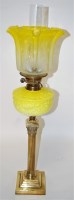Lot 75 - A Victorian oil lamp, having yellow tinted...