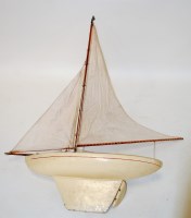 Lot 94 - An early 20th century cream painted pond yacht...