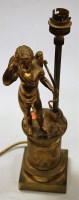Lot 100 - An early 20th century gilt metal table lamp,...