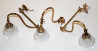 Lot 102 - A pair of early 20th century adjustable brass...