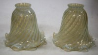 Lot 170 - A pair of vaseline tinted glass lampshades,...