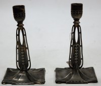 Lot 175 - A pair of Art Nouveau pressed metal...