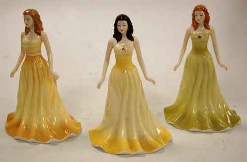 Lot 176 - A set of three modern Royal Doulton ladies...