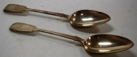 Lot 179 - A pair of late Victorian silver table spoons...